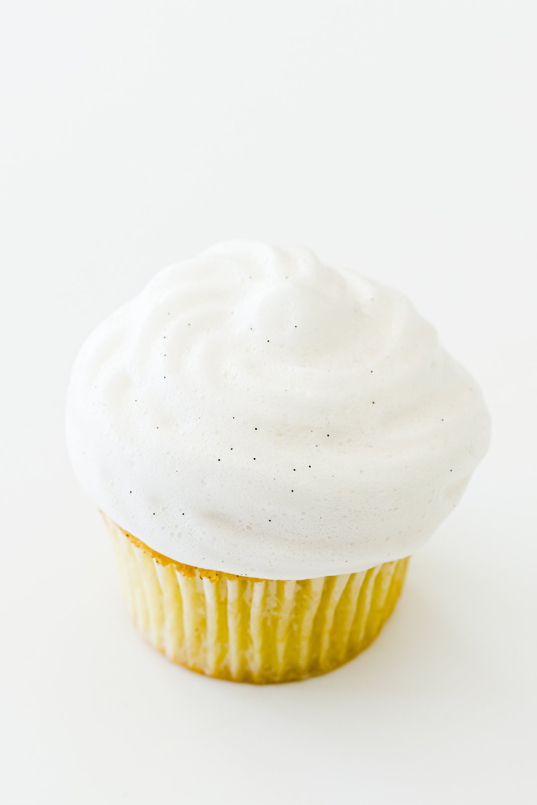 Aquafaba meringue on a cupcake without torching