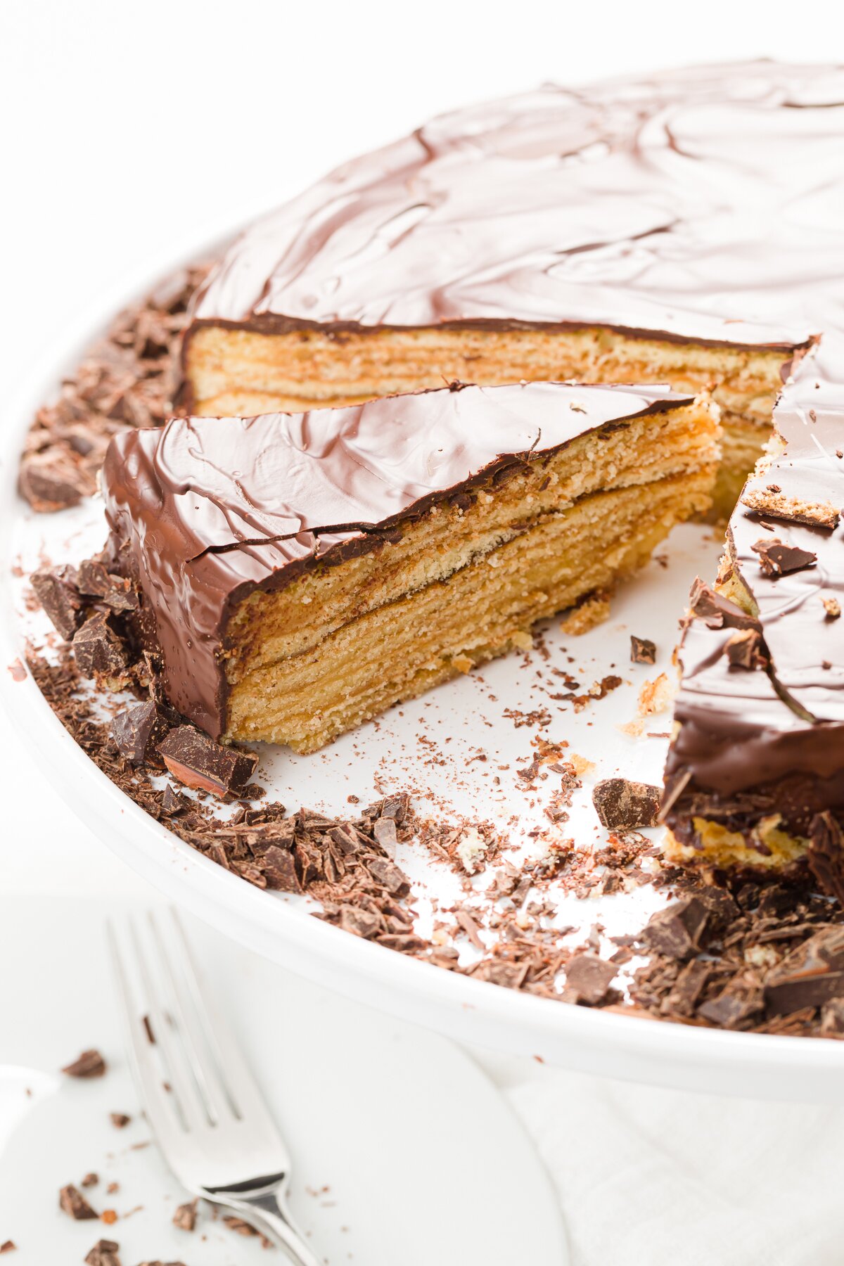 Slice of baumkuchen pulled out of the cake