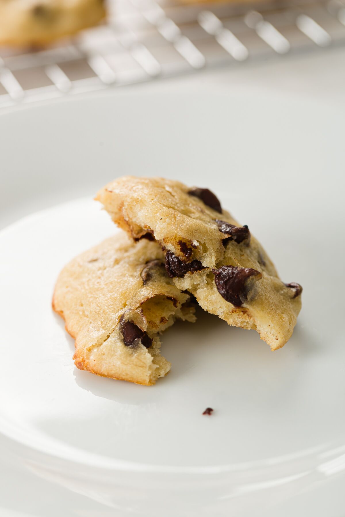 Banana cookie split in half on a plate
