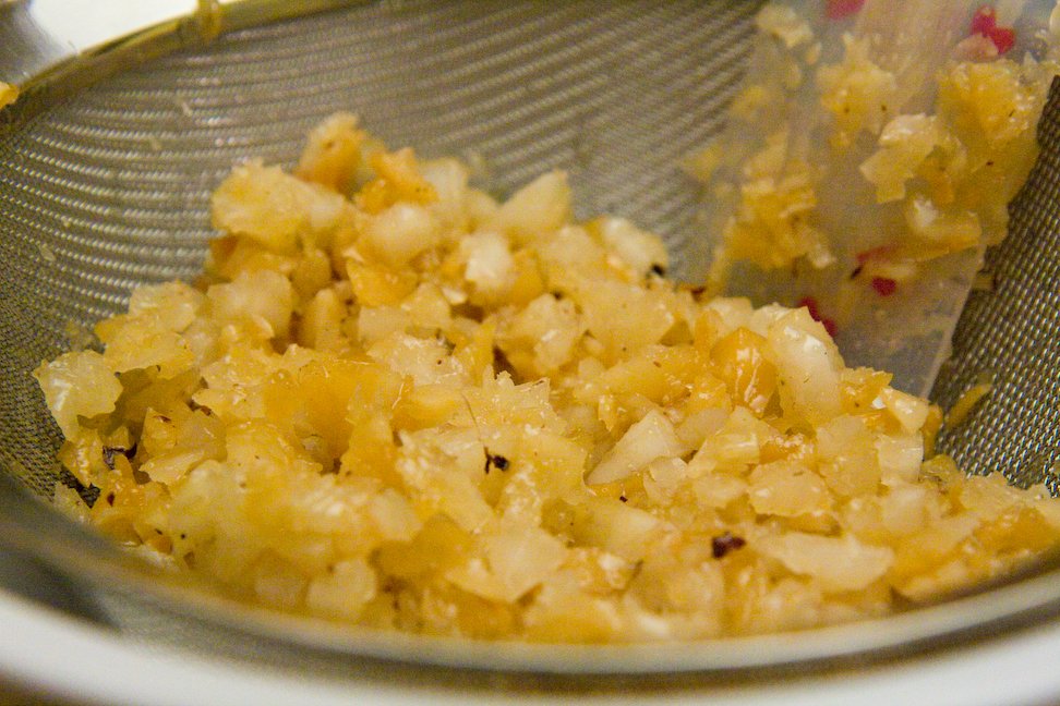 Straining syrup from coconut