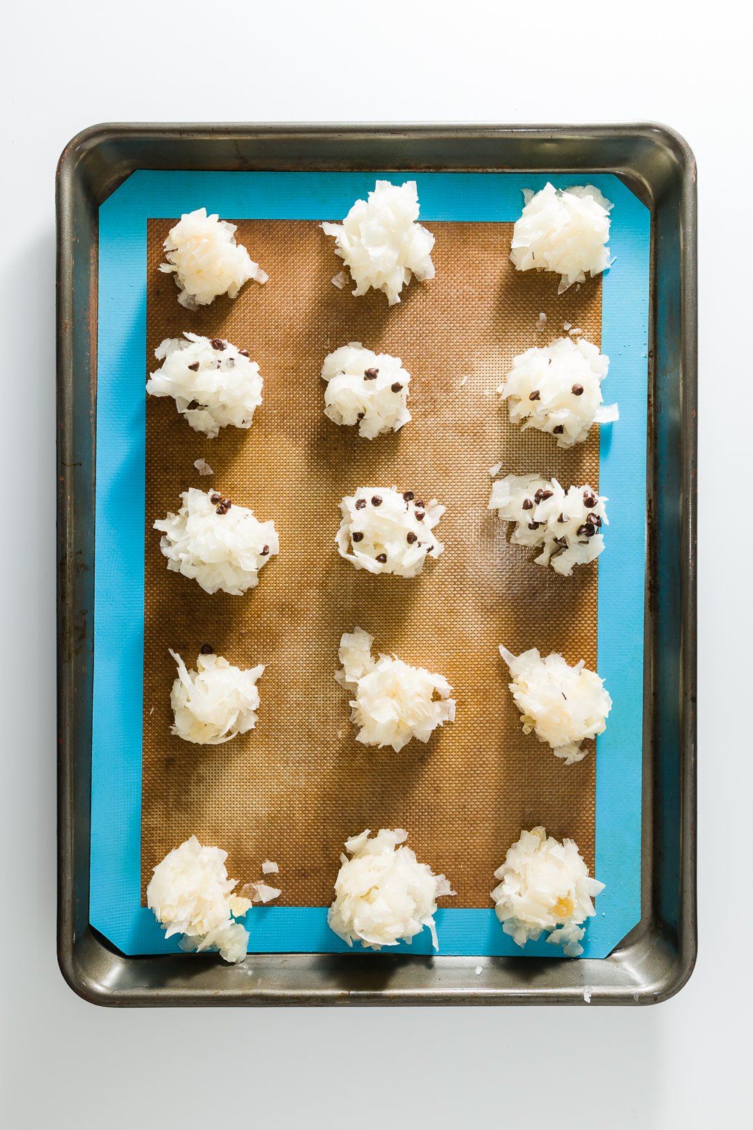 Balls of coconut macaroons ready to go into the oven