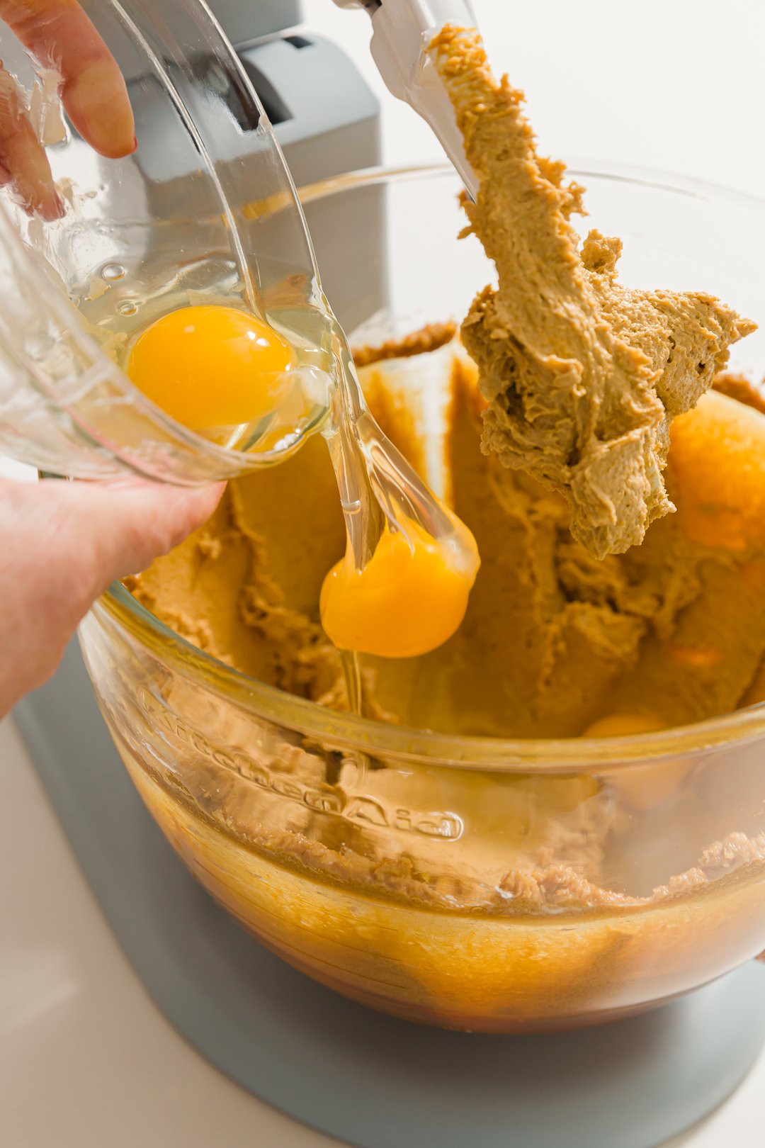 Adding eggs to batter