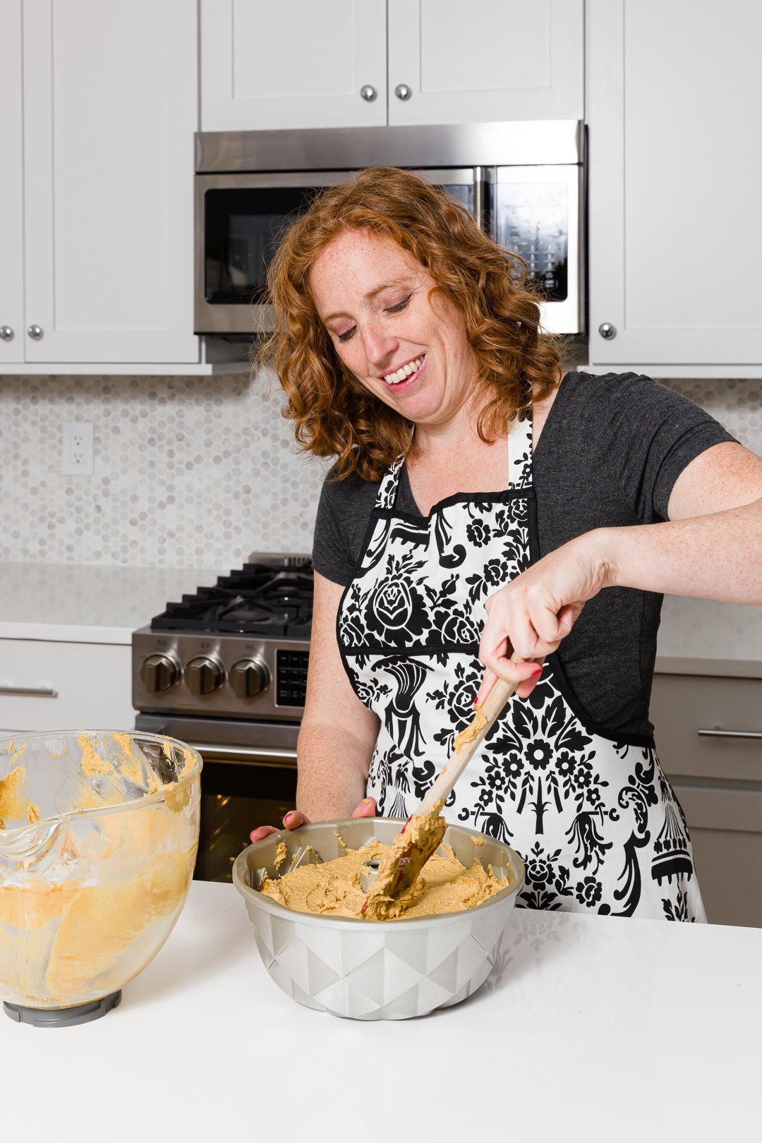 Spreading batter over cranberries 