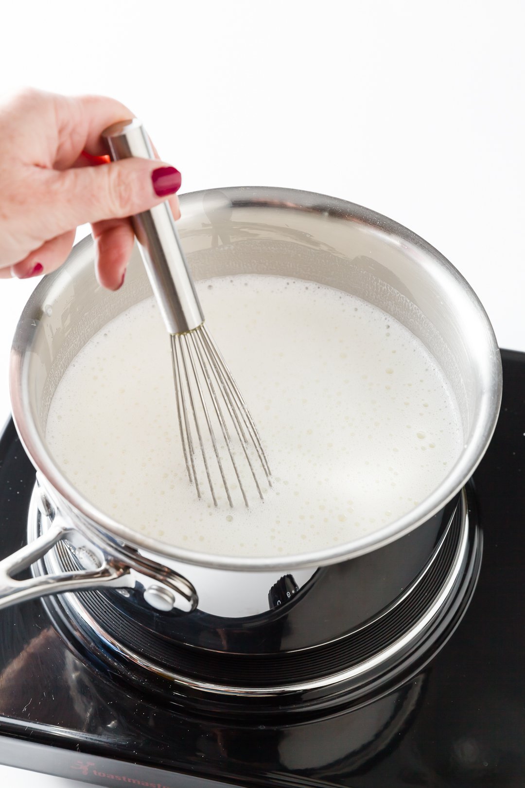 Whisking dulce de leche