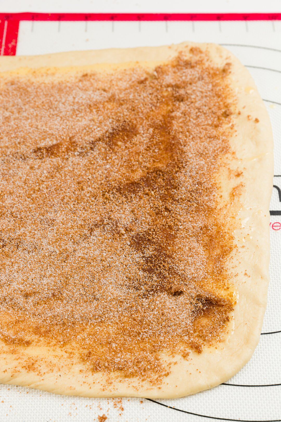 Rolled out dough covered with spiced sugar