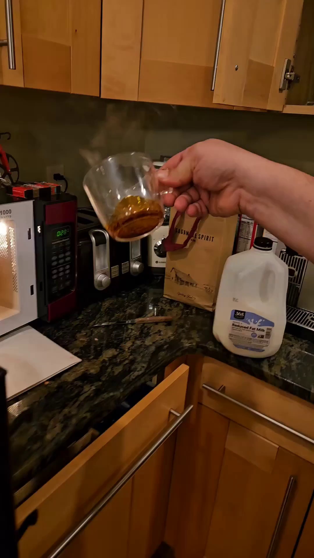 Cooked sugar in a glass cup.