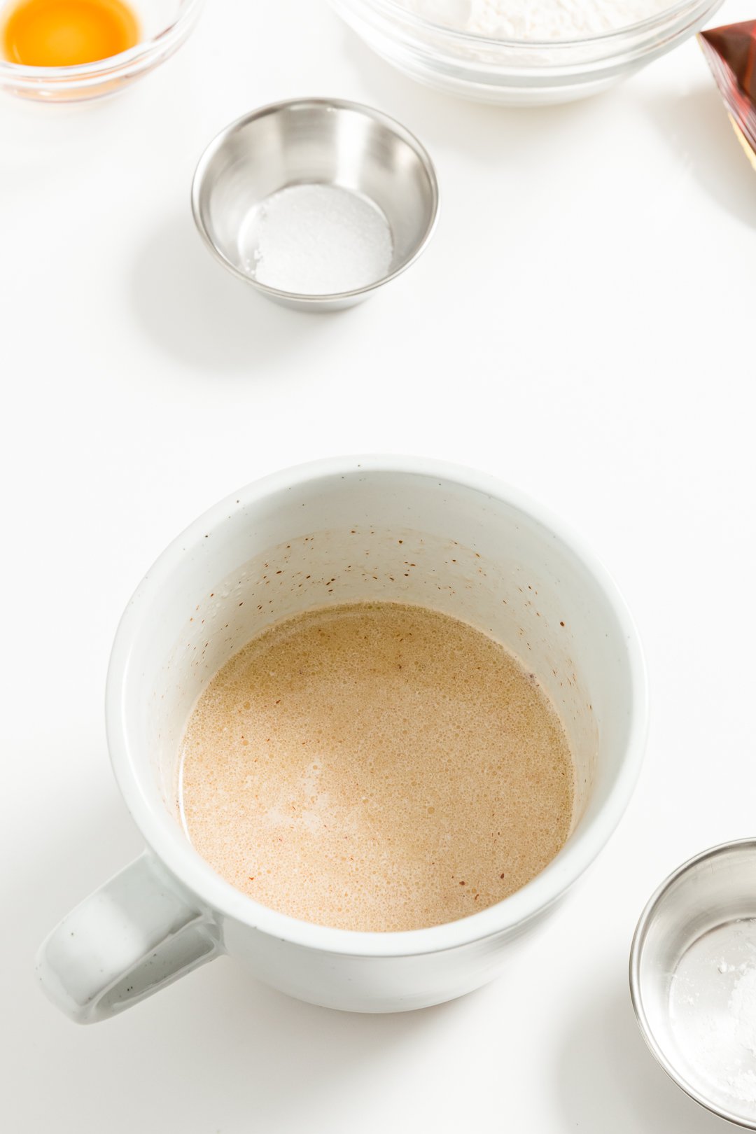 Melted butter, milk, and chocolate in a mug