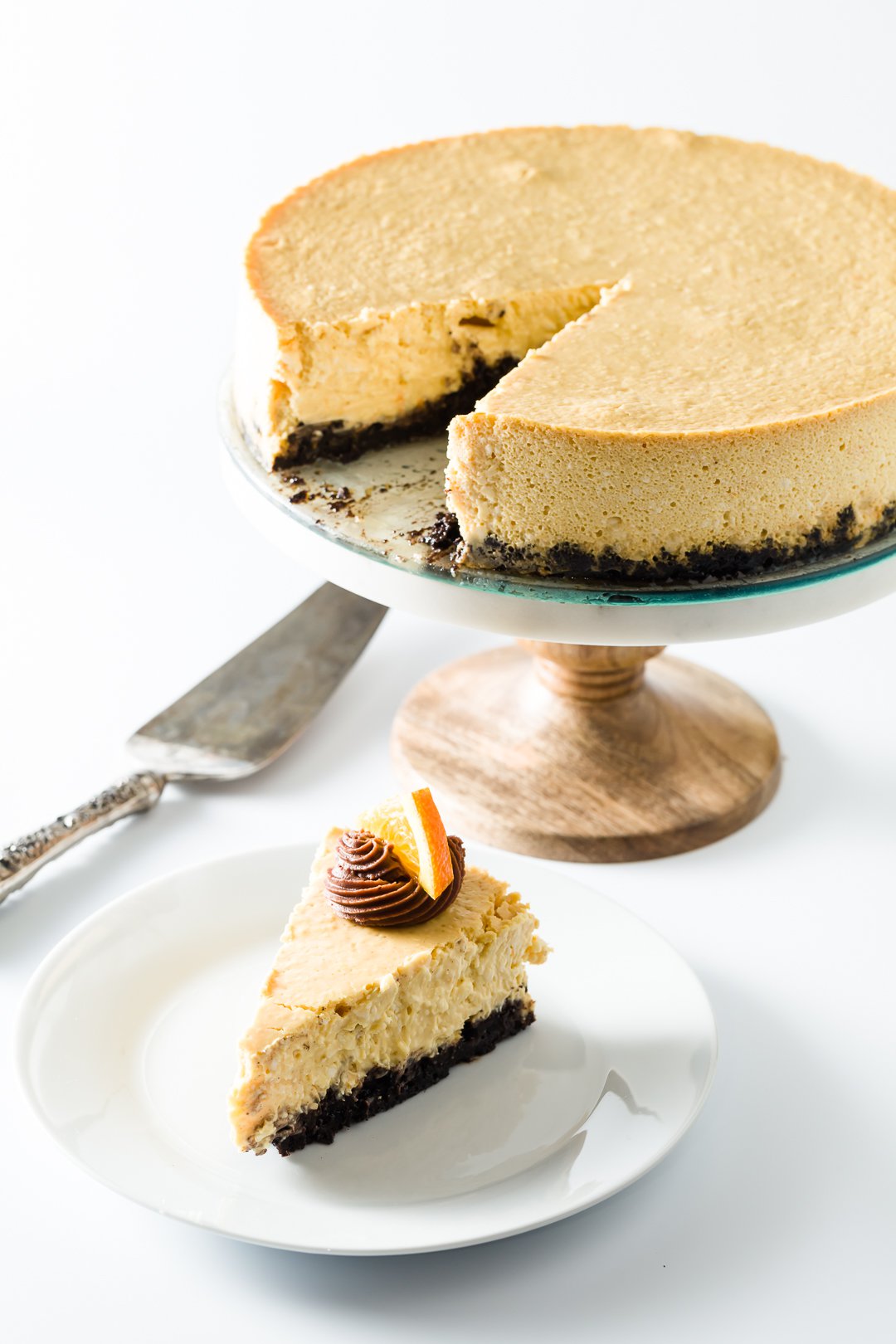 Orange cheesecake with one slice removed