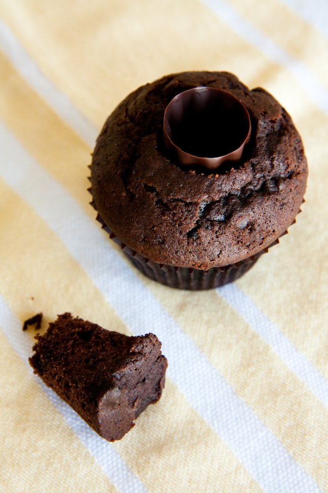 Oreo cupcake with a piece taken out